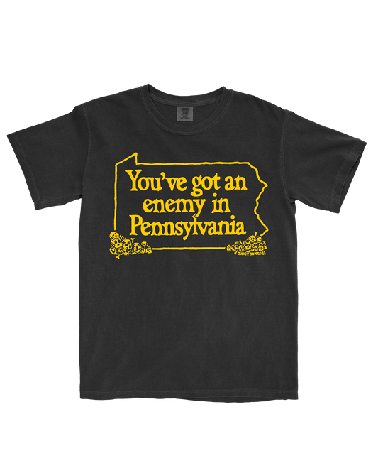 Black t-shirt with yellow text 'You've got an enemy in Pennsylvania' and Pennsylvania outline