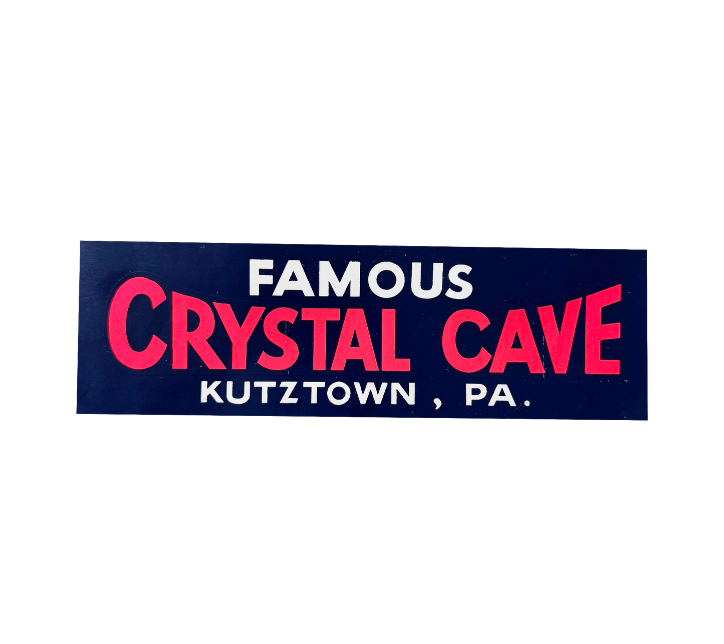 Famous Crystal Cave sign with pink text on a blue background