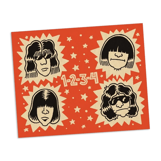 Print with four stylized faces on a red background with star patterns