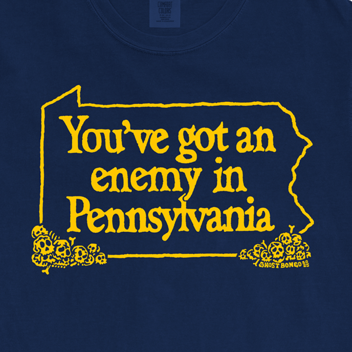 Navy blue t-shirt with yellow text and design on a white background