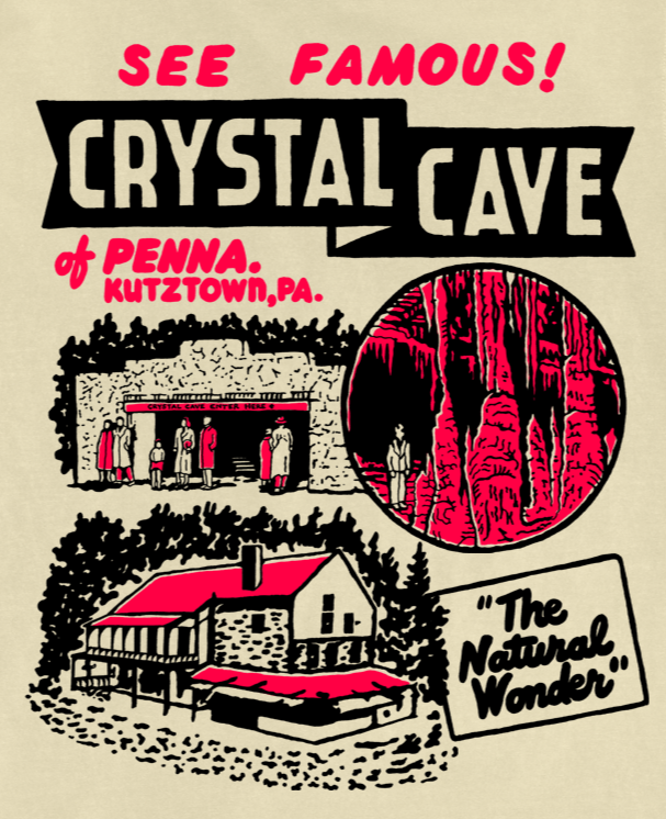 Beige t-shirt with 'Crystal Cave' graphic design on a white background