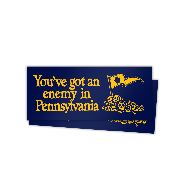 Two stickers with yellow text "You've got an enemy in Pennsylvania" and a flag graphic on a blue background