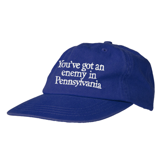 Blue cap with white text 'You've got an enemy in Pennsylvania' 