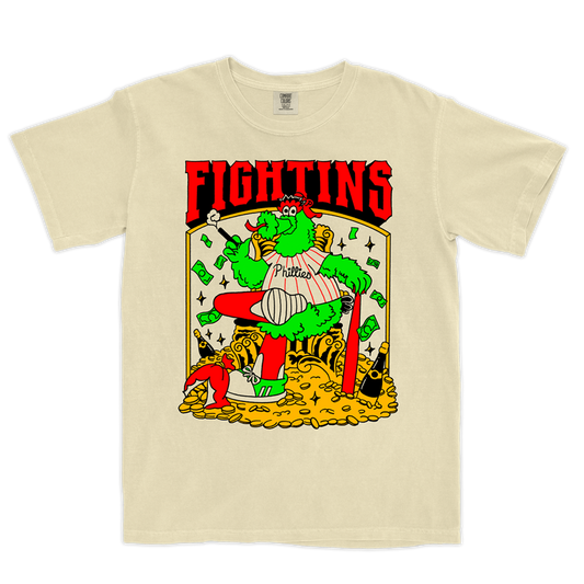 Beige t-shirt with colorful graphic design featuring a character and 'FIGHTINS' text on a white background.