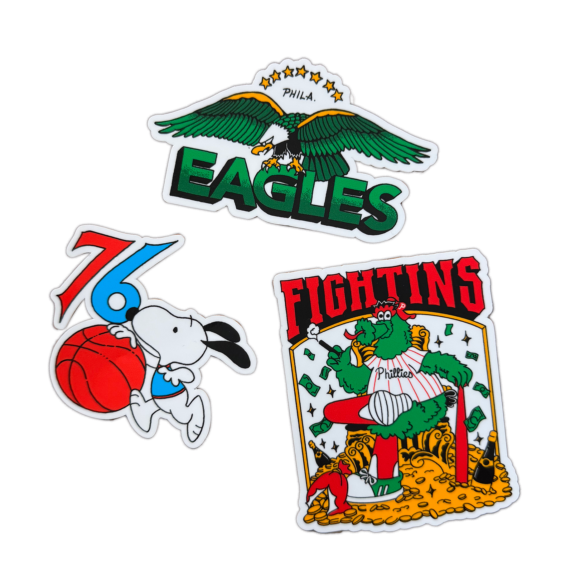 Three colorful stickers featuring an eagle, a cartoon character with a basketball, and a card-themed design on a white background.