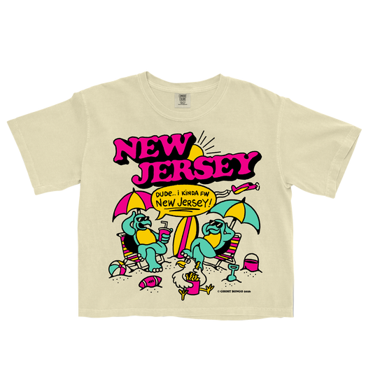 Beige t-shirt with 'New Jersey' graphic design featuring cartoon characters and text on a white background.
