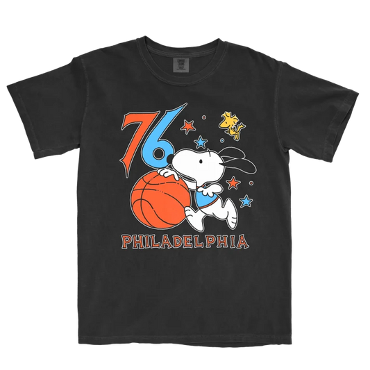 Black t-shirt with a graphic of Snoopy playing basketball and the number 76