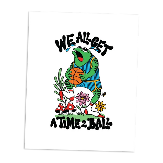 Cartoon frog holding a basketball with text 'WE ALL GET A TIME 2 BALL' on a white background